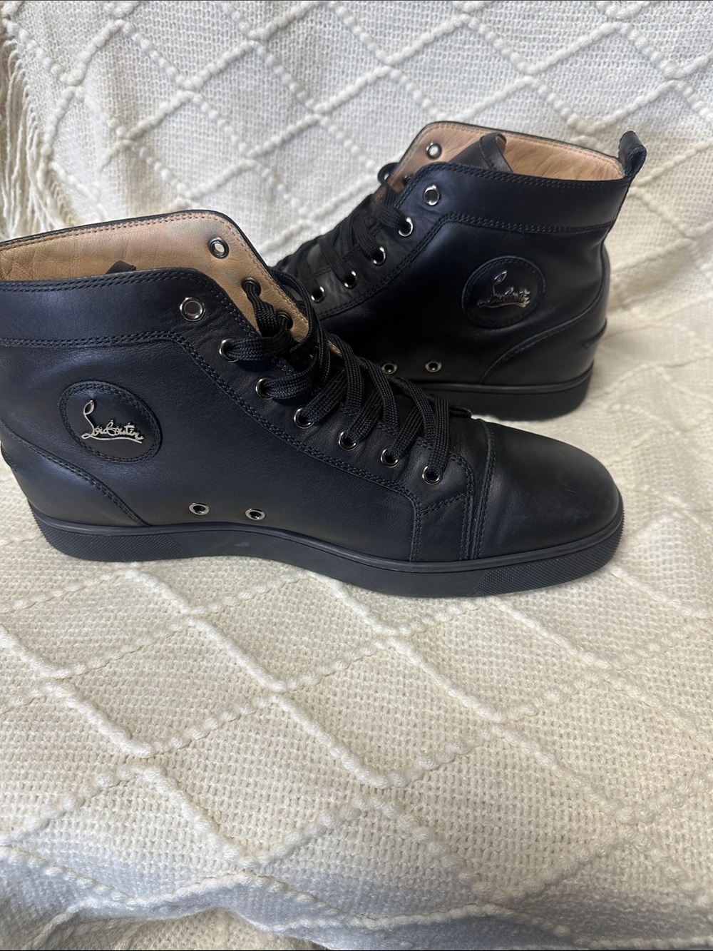Christian Louboutin Black Leather High-Top Sneakers with Subtle Logo